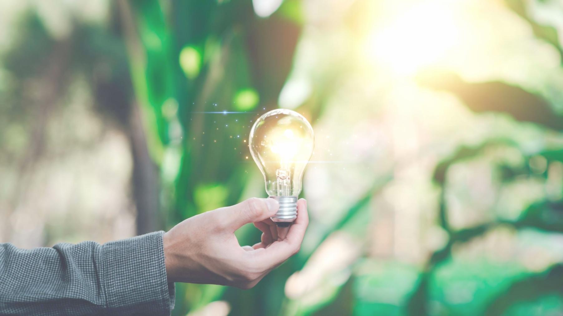 Technology partnership collaboration workspace showing multiple screens with data visualization interfaces